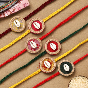 Handmade jute fabart shell work rakhi (set of 6) 153