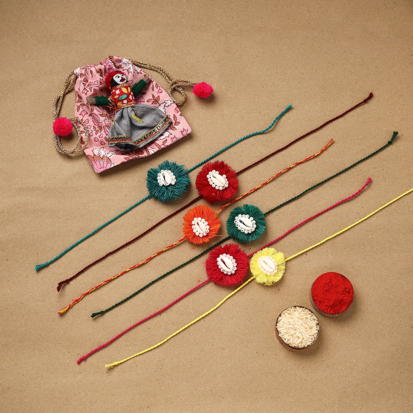 Handmade jute fabart shell work rakhi (set of 6) 154