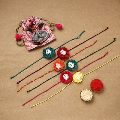 Handmade jute fabart shell work rakhi (set of 6) 154