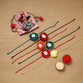 Handmade jute fabart shell work rakhi (set of 6) 154