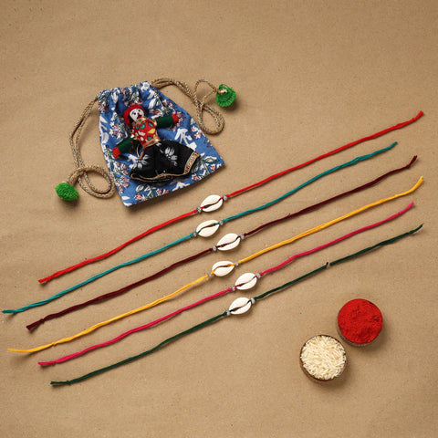 Handmade jute fabart shell work rakhi (set of 6) 160