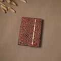 Handmade paper notebook in ajrakh fabric cover with thread