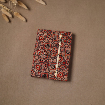Handmade paper notebook in ajrakh fabric cover with thread