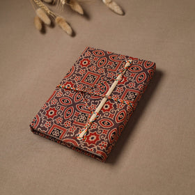 Handmade paper notebook in ajrakh fabric cover with thread