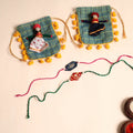  Handmade Pearl Fabric Rakhi (Set of 2)