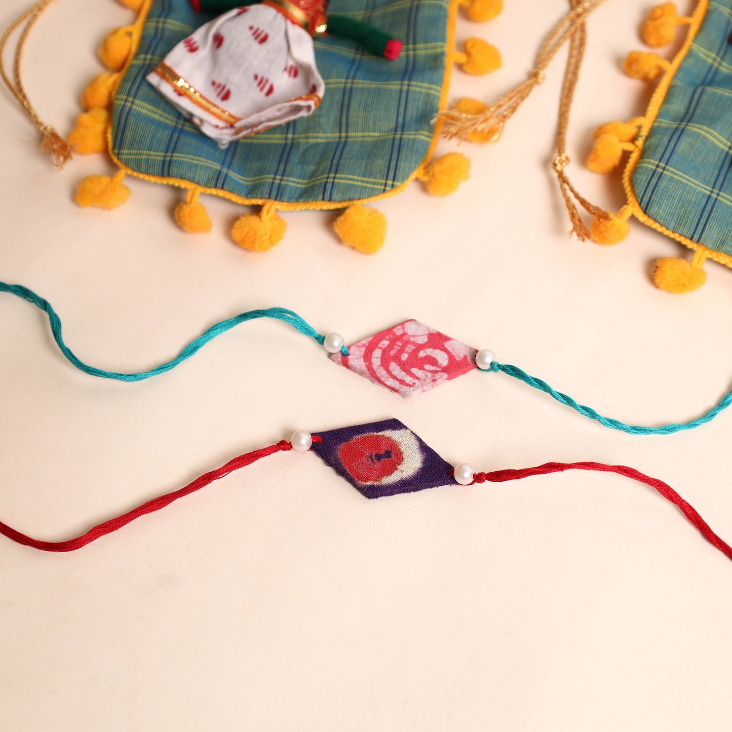  Handmade Pearl Fabric Rakhi (Set of 2)