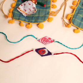  Handmade Pearl Fabric Rakhi (Set of 2)