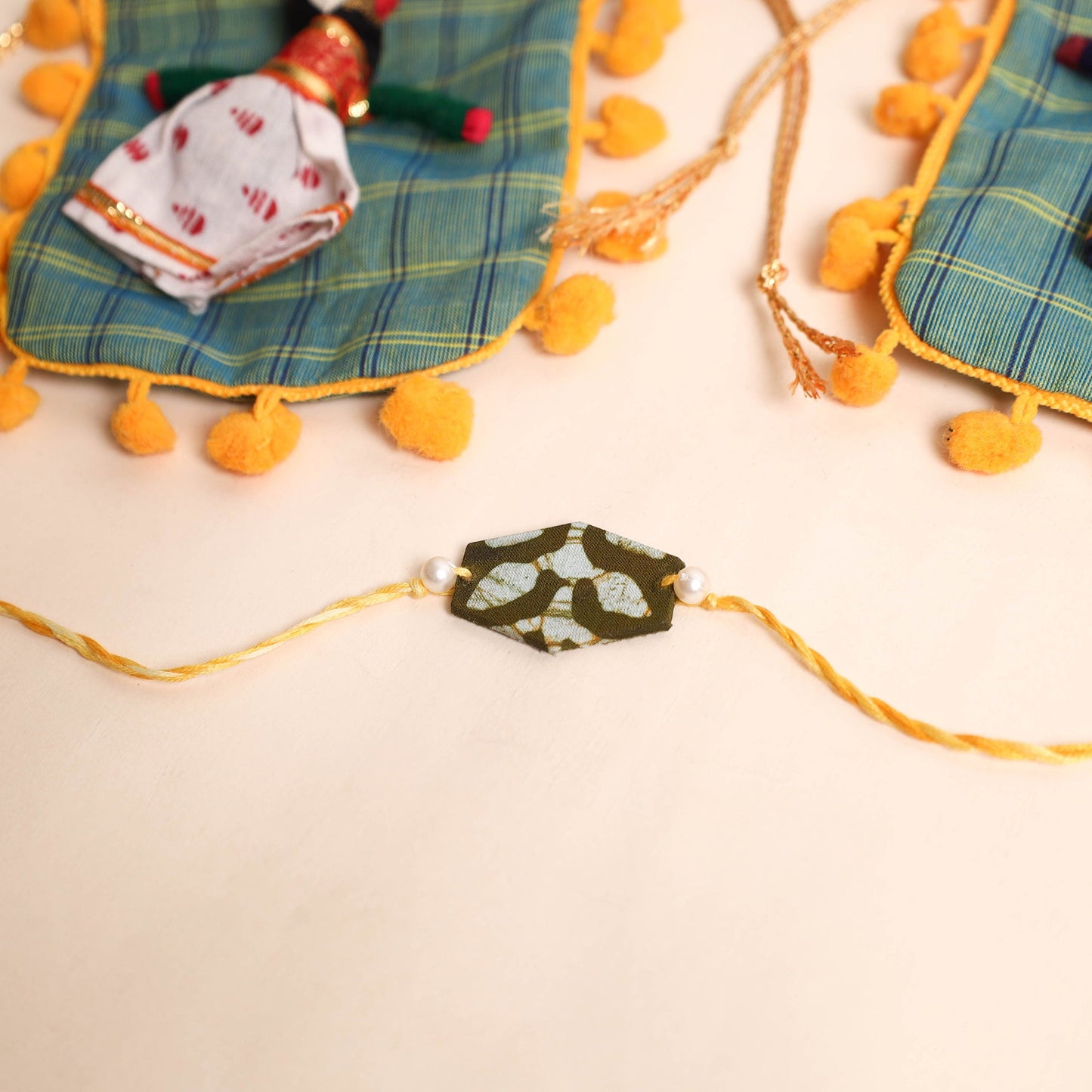  Handmade Pearl Fabric Rakhi (Set of 2)