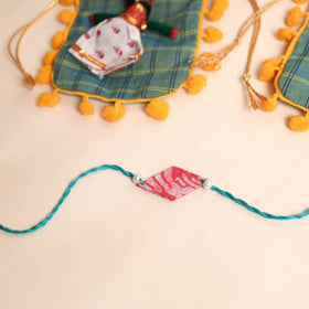  Handmade Pearl Fabric Rakhi (Set of 2)