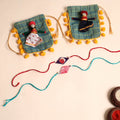  Handmade Pearl Fabric Rakhi (Set of 2)