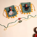  Handmade Pearl Fabric Rakhi (Set of 2)