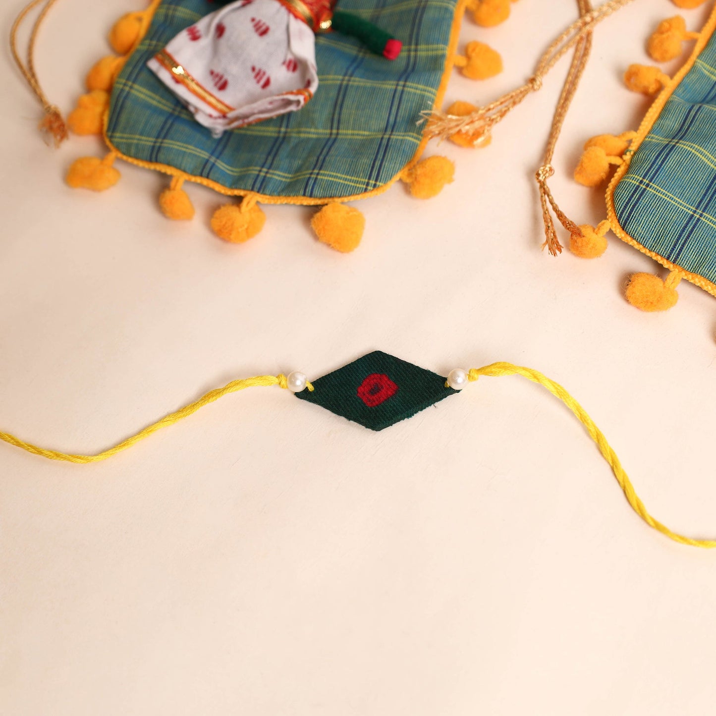  Handmade Pearl Fabric Rakhi (Set of 2)