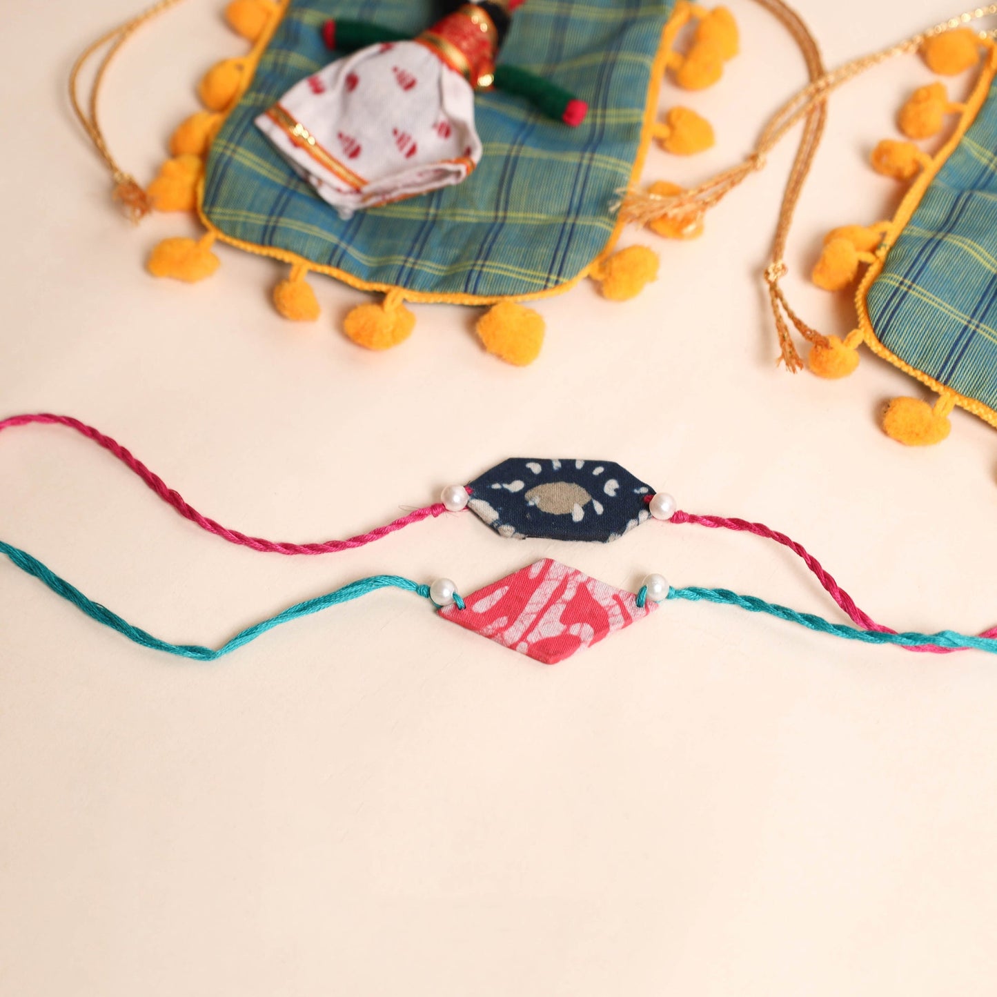  Handmade Pearl Fabric Rakhi (Set of 2)