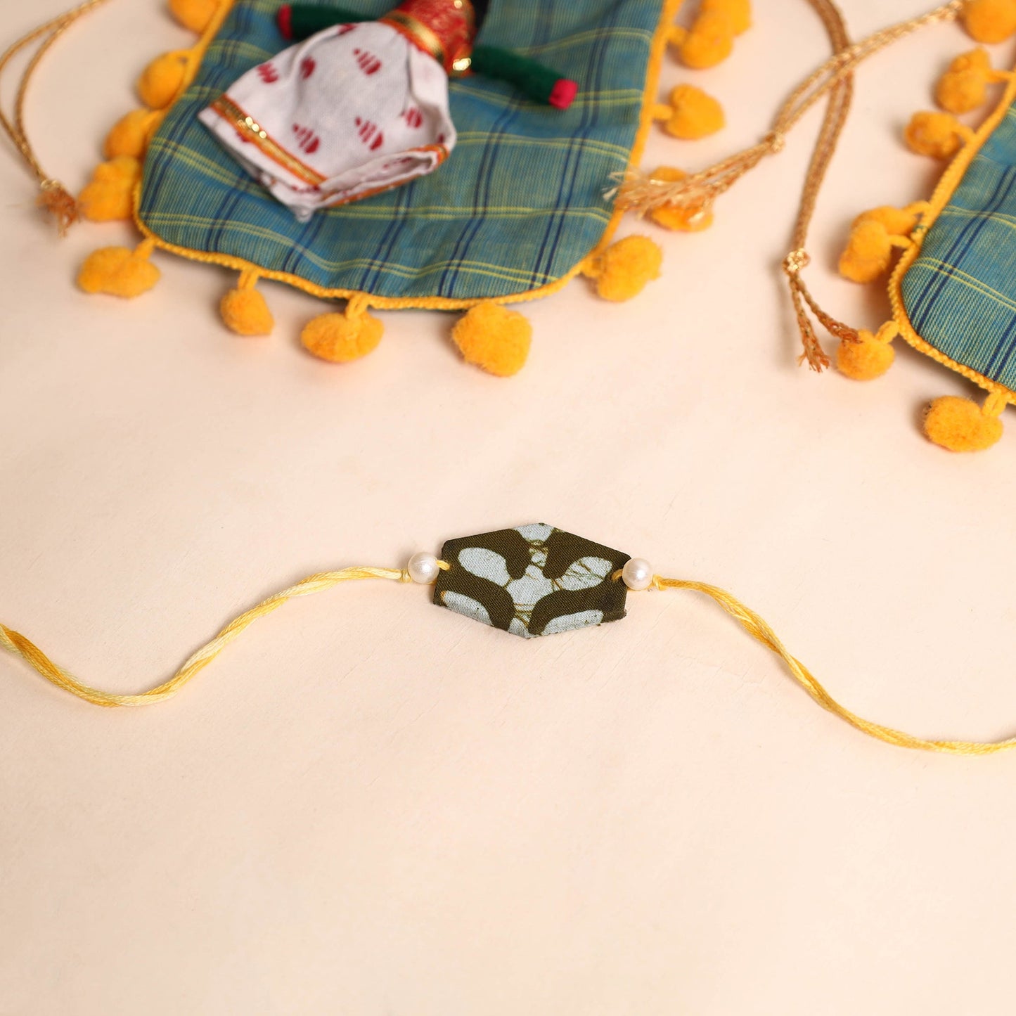  Handmade Pearl Fabric Rakhi (Set of 2)