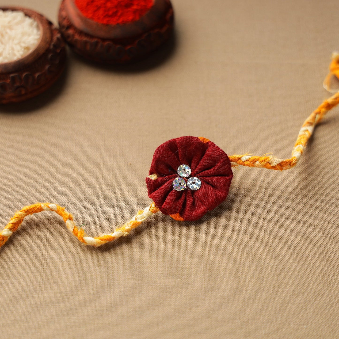  Handmade Sequin Work Braided Rakhi 09 