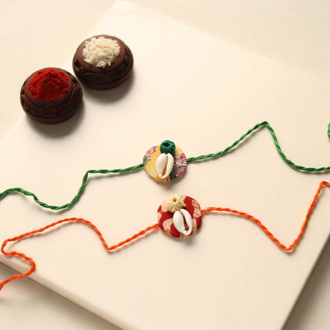 Handmade Shell Work Fabart Rakhi (Set of 2)