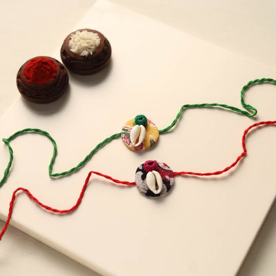 Handmade Shell Work Fabart Rakhi (Set of 2)