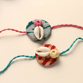 Handmade Shell Work Fabart Rakhi (Set of 2)