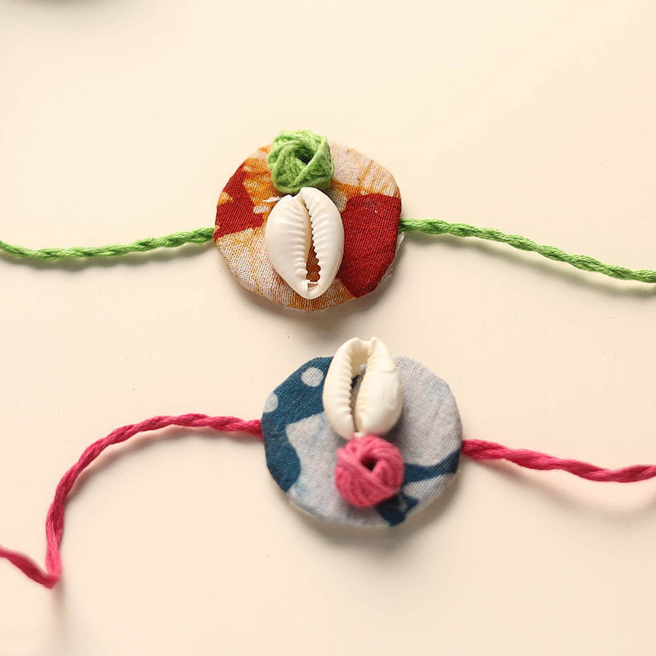 Handmade Shell Work Fabart Rakhi (Set of 2)