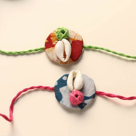 Handmade Shell Work Fabart Rakhi (Set of 2)