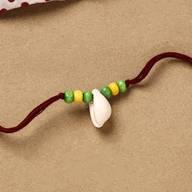 Handmade shell work rakhi 142 - handcrafted