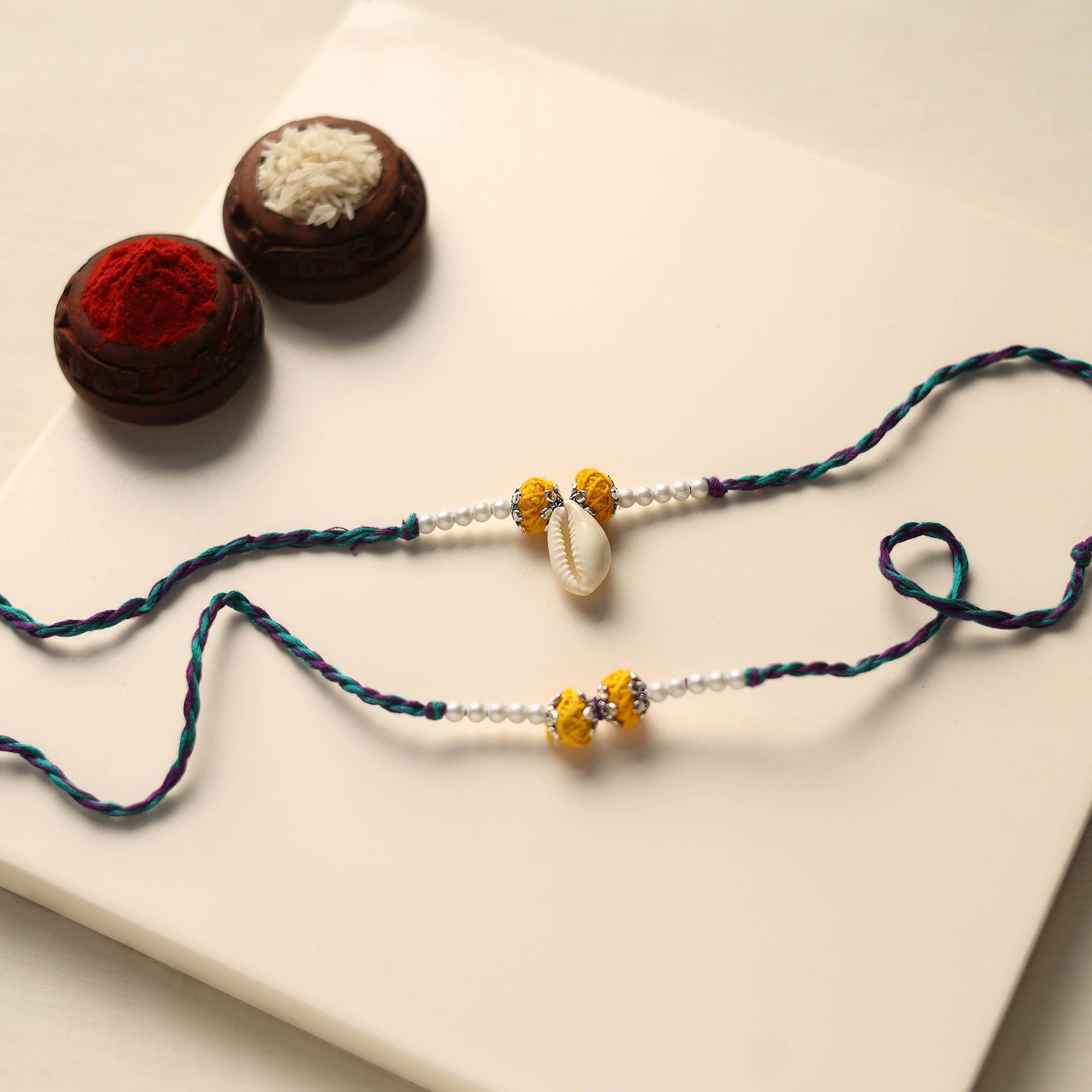 Talib Rakni Handmade Thread & Bead Work Bhaiya Bhabhi Rakhi Set