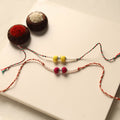 Handmade Thread & Bead Work Rakhi (Set of 2)