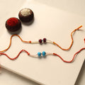 Handmade Thread & Bead Work Rakhi (Set of 2)