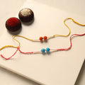 Handmade Thread & Bead Work Rakhi (Set of 2)