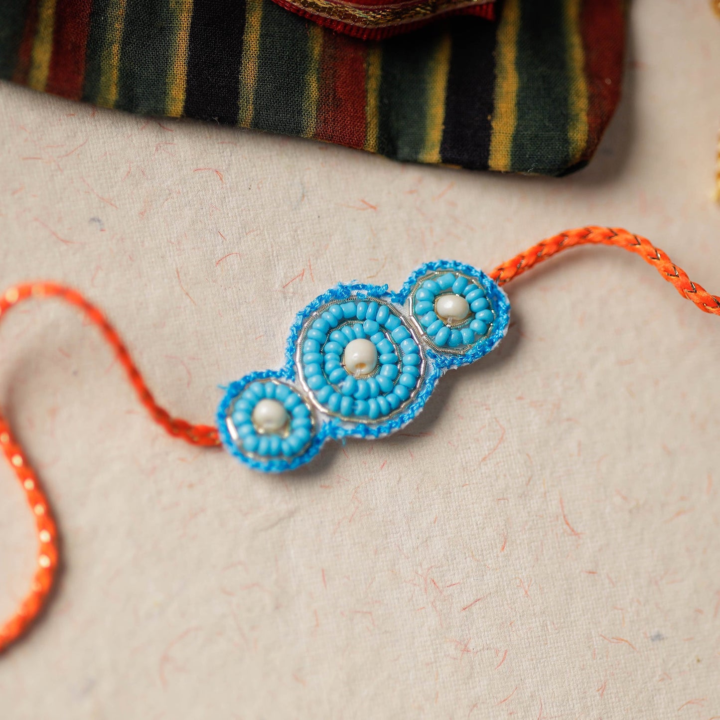 Handmade Thread & Beadwork Rakhi By Jugni