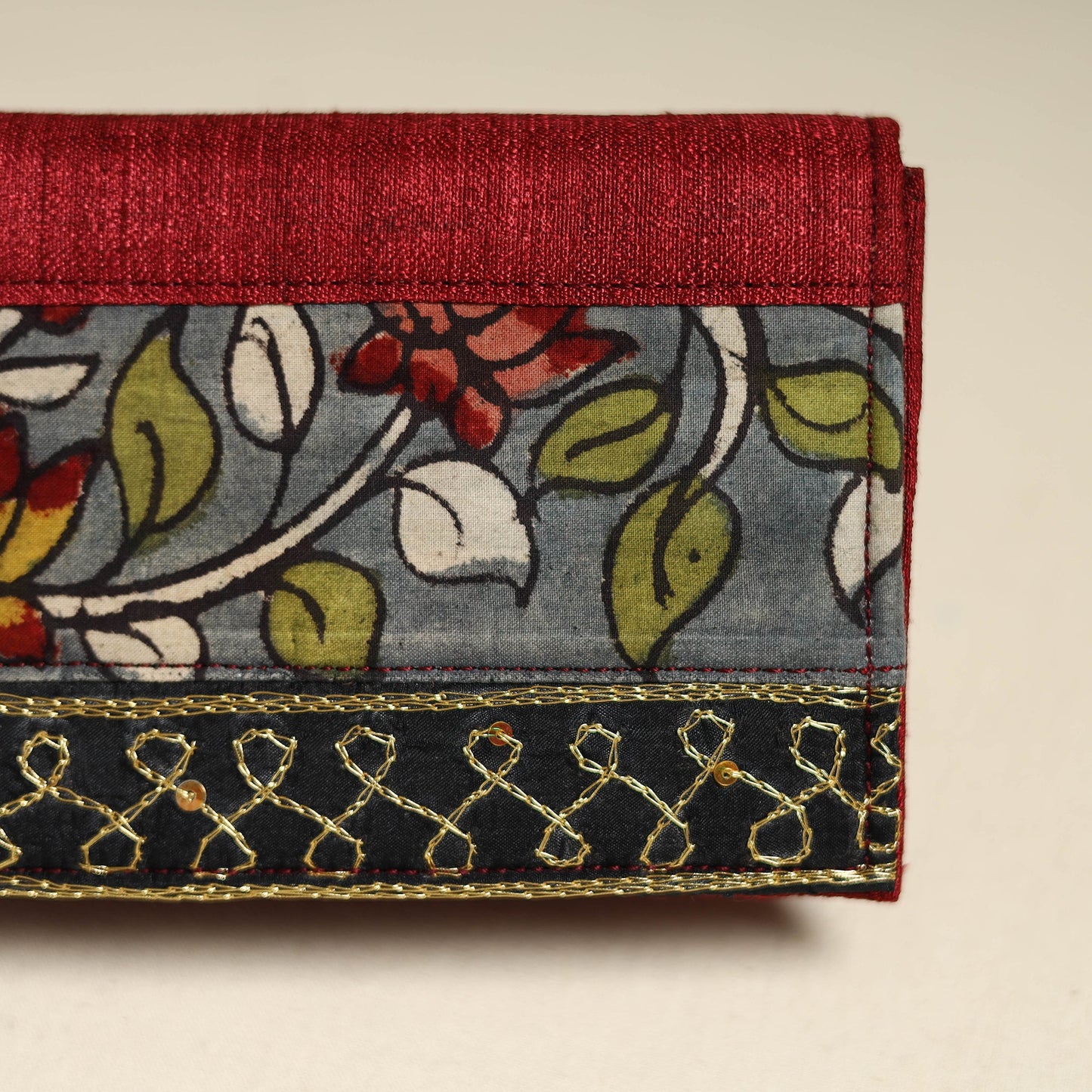 Handpainted kalamkari natural dyed ghicha silk clutch