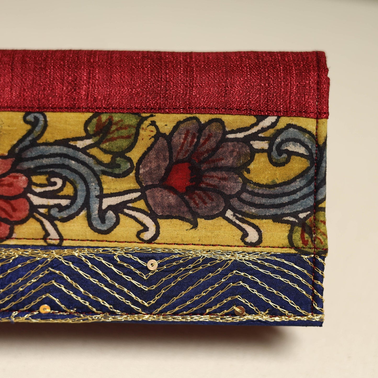 Handpainted kalamkari natural dyed ghicha silk clutch