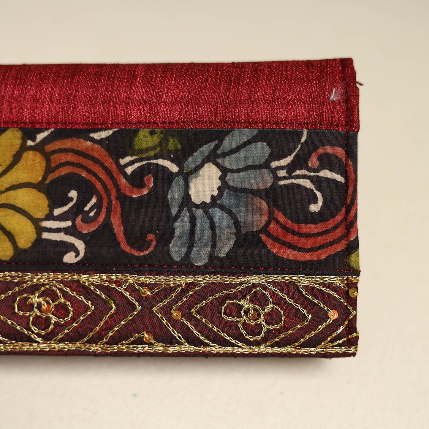 Handpainted kalamkari natural dyed ghicha silk clutch
