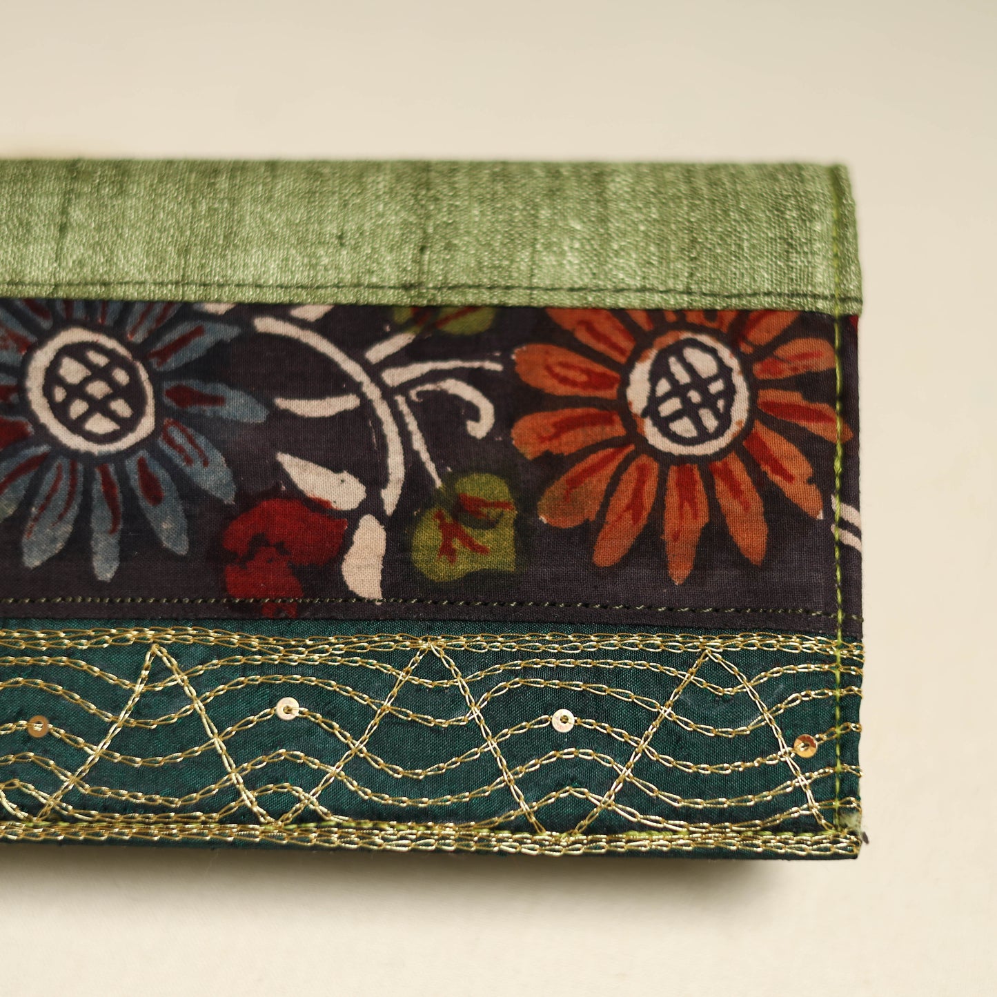 Handpainted kalamkari natural dyed ghicha silk clutch