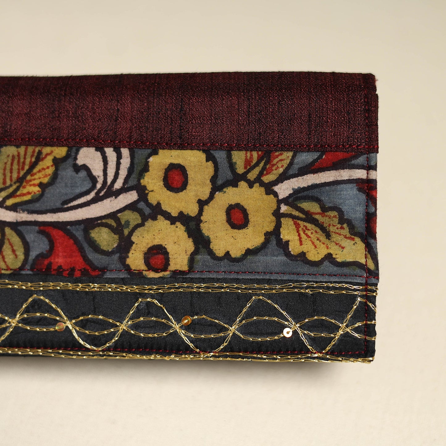 Handpainted kalamkari natural dyed ghicha silk clutch