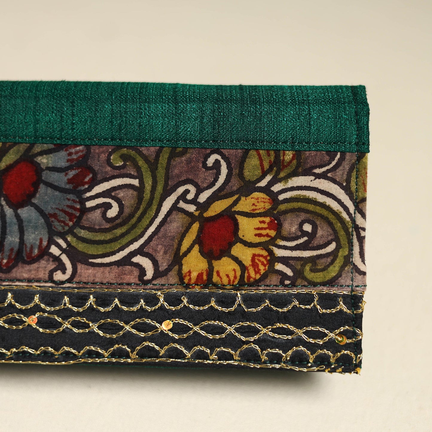 Handpainted kalamkari natural dyed ghicha silk clutch