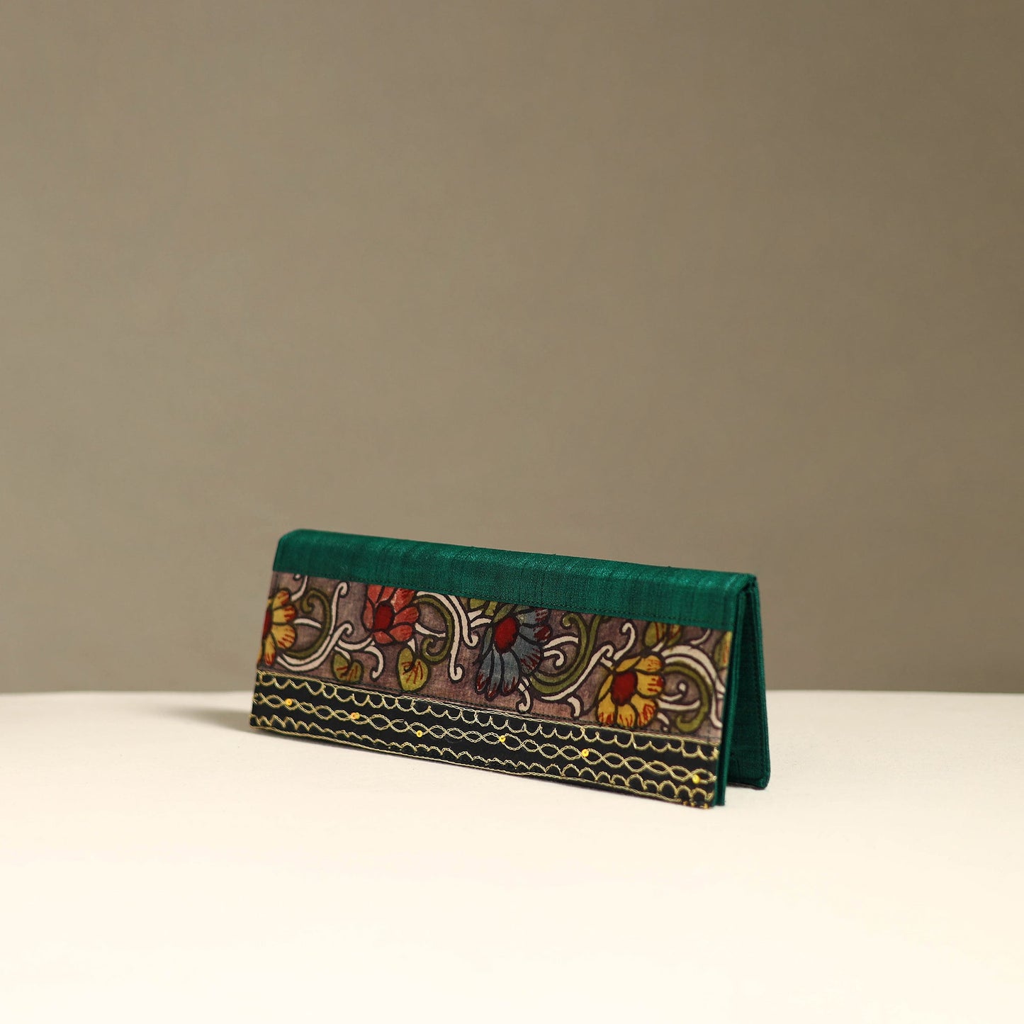 Handpainted kalamkari natural dyed ghicha silk clutch