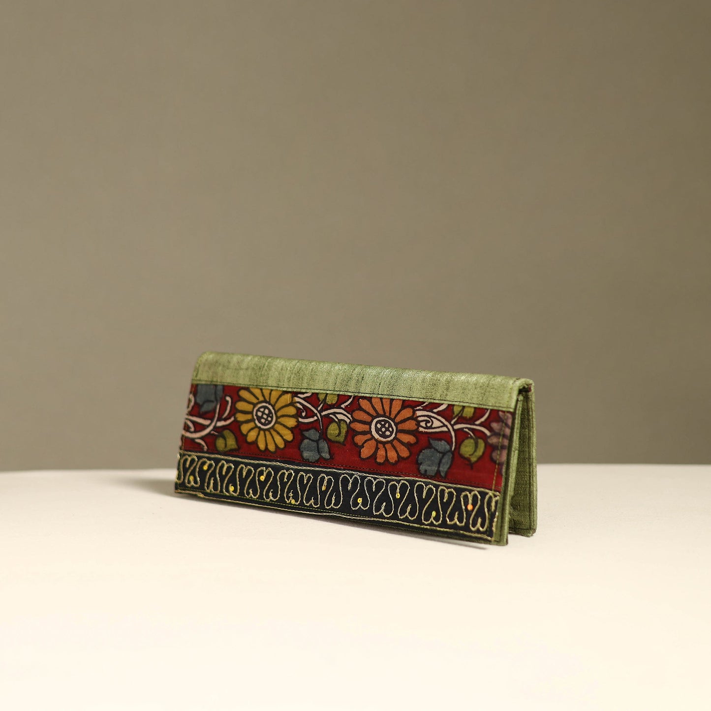 Handpainted kalamkari natural dyed ghicha silk clutch