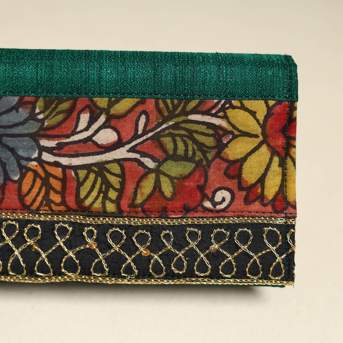 Handpainted kalamkari natural dyed ghicha silk clutch