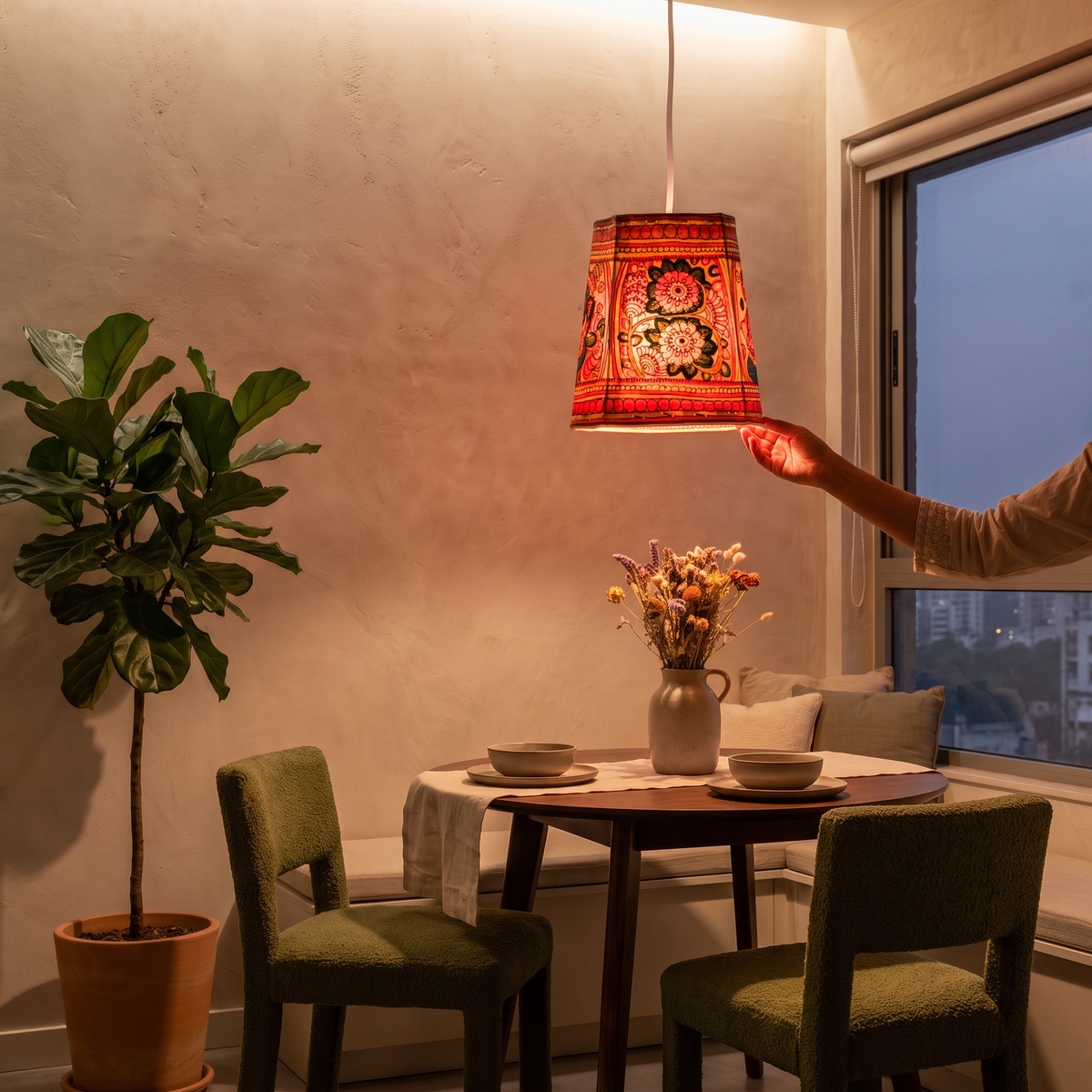 Handpainted Tholu Bommalata Leather Hanging Lamp, lit in a home in the evening, AI visual of the light, iTokri