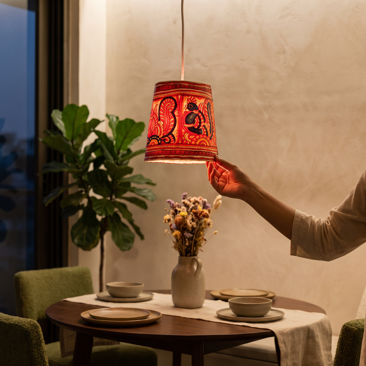 Handpainted Tholu Bommalata Leather Hanging Lamp, lit in a home in the evening, AI visual of the light, iTokri