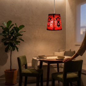 Handpainted Tholu Bommalata Leather Hanging Lamp, lit in a home in the evening, AI visual of the light, iTokri