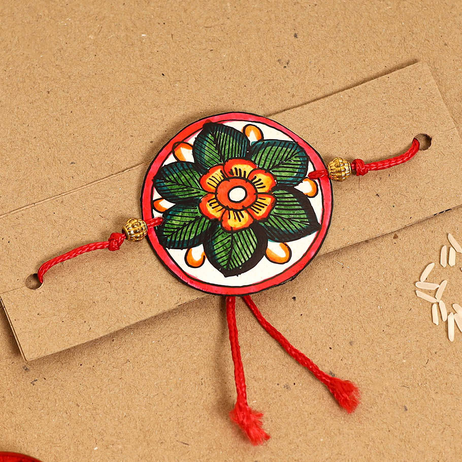  Handpainted Tholu Bommalata Leather Rakhi 