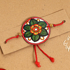  Handpainted Tholu Bommalata Leather Rakhi 