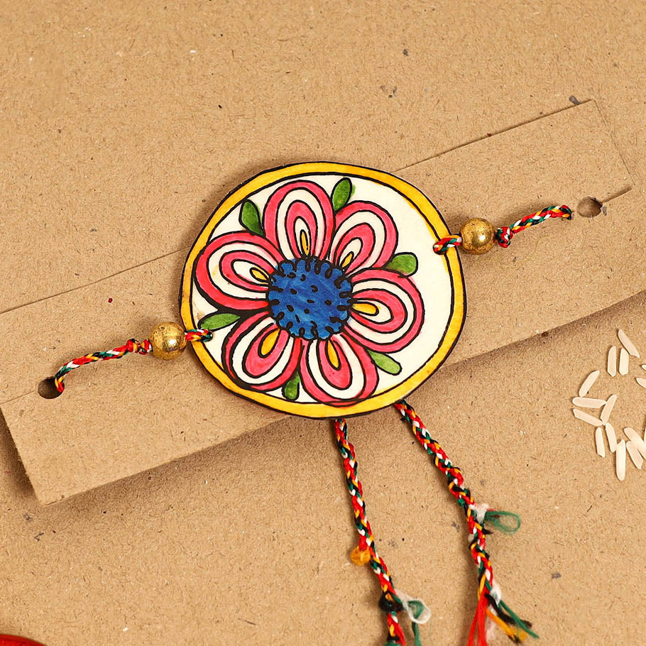  Handpainted Tholu Bommalata Leather Rakhi 
