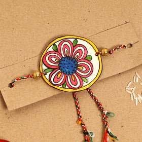  Handpainted Tholu Bommalata Leather Rakhi 