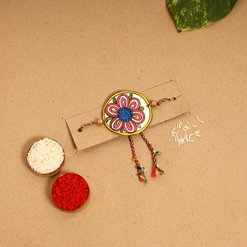  Handpainted Tholu Bommalata Leather Rakhi 