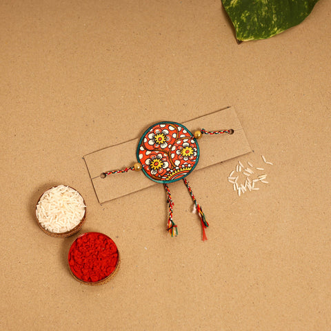  Handpainted Tholu Bommalata Leather Rakhi 