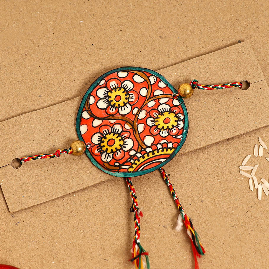  Handpainted Tholu Bommalata Leather Rakhi 