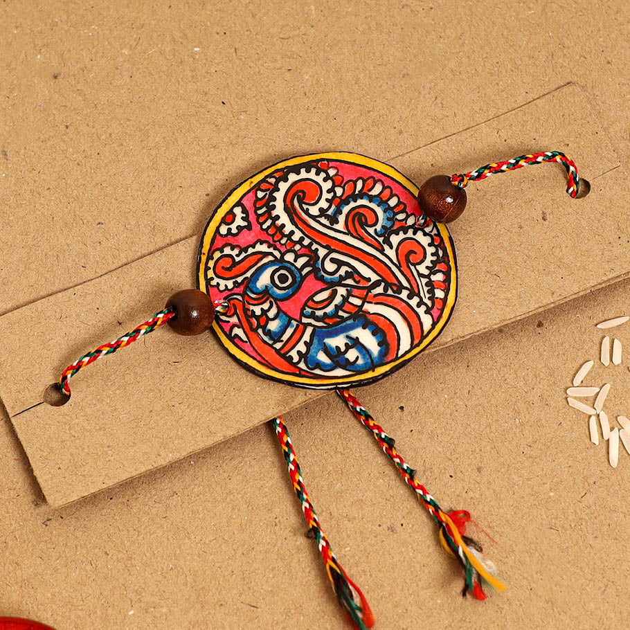  Handpainted Tholu Bommalata Leather Rakhi 